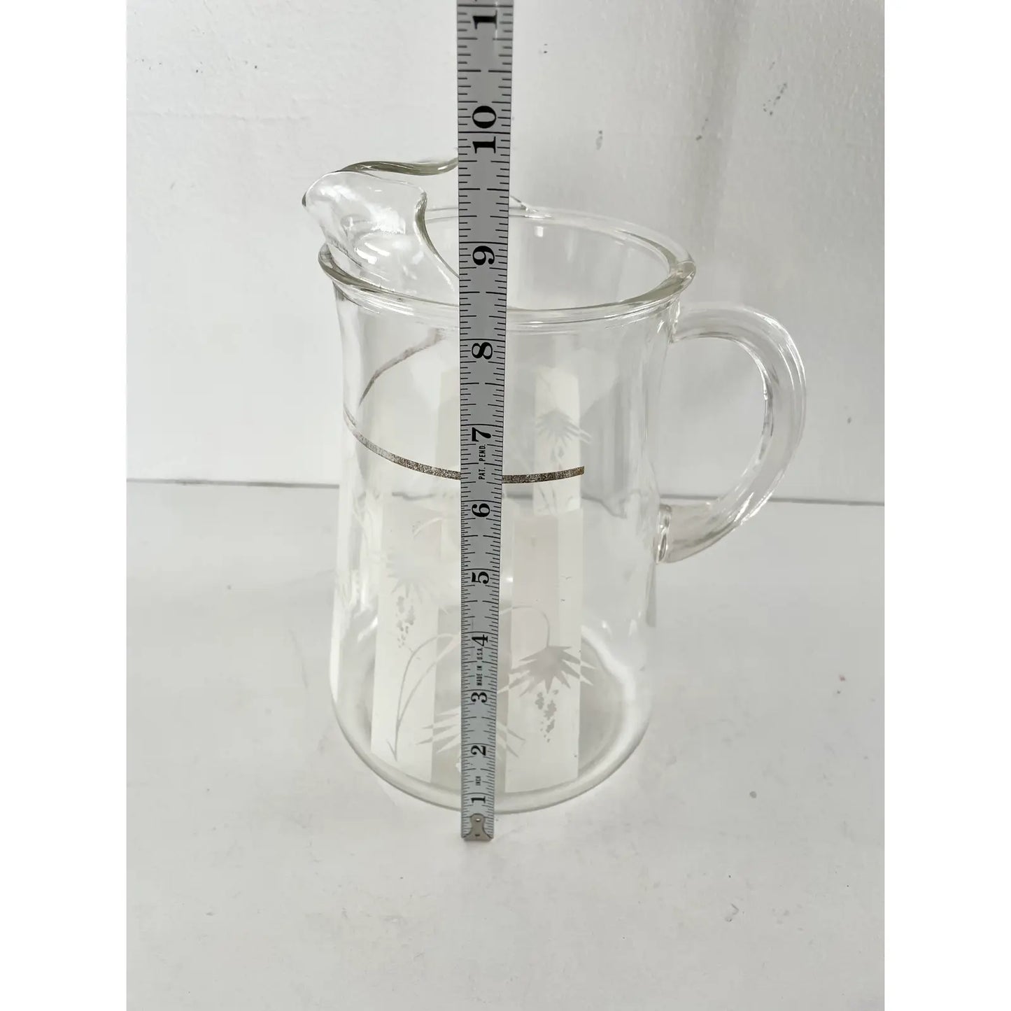 Mid Century Modern Living Clear Pitcher With White Painted Desert Flower