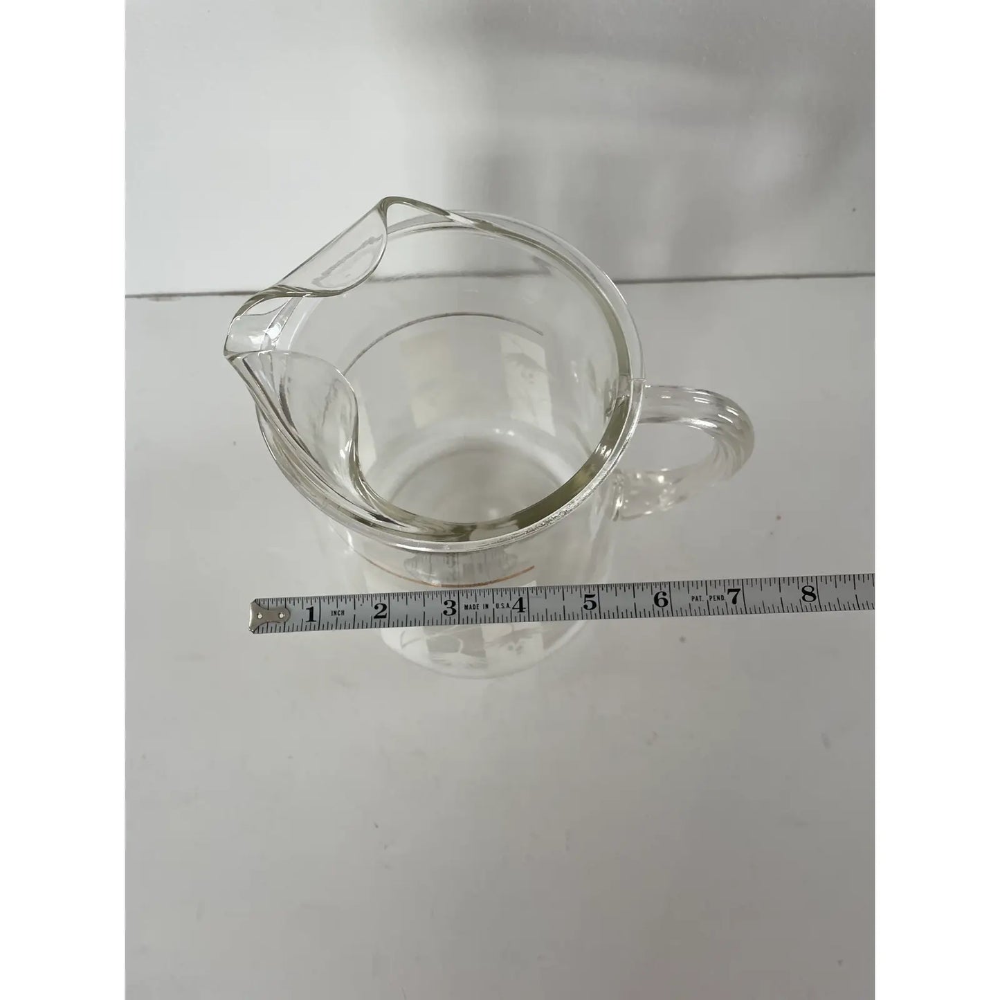 Mid Century Modern Living Clear Pitcher With White Painted Desert Flower