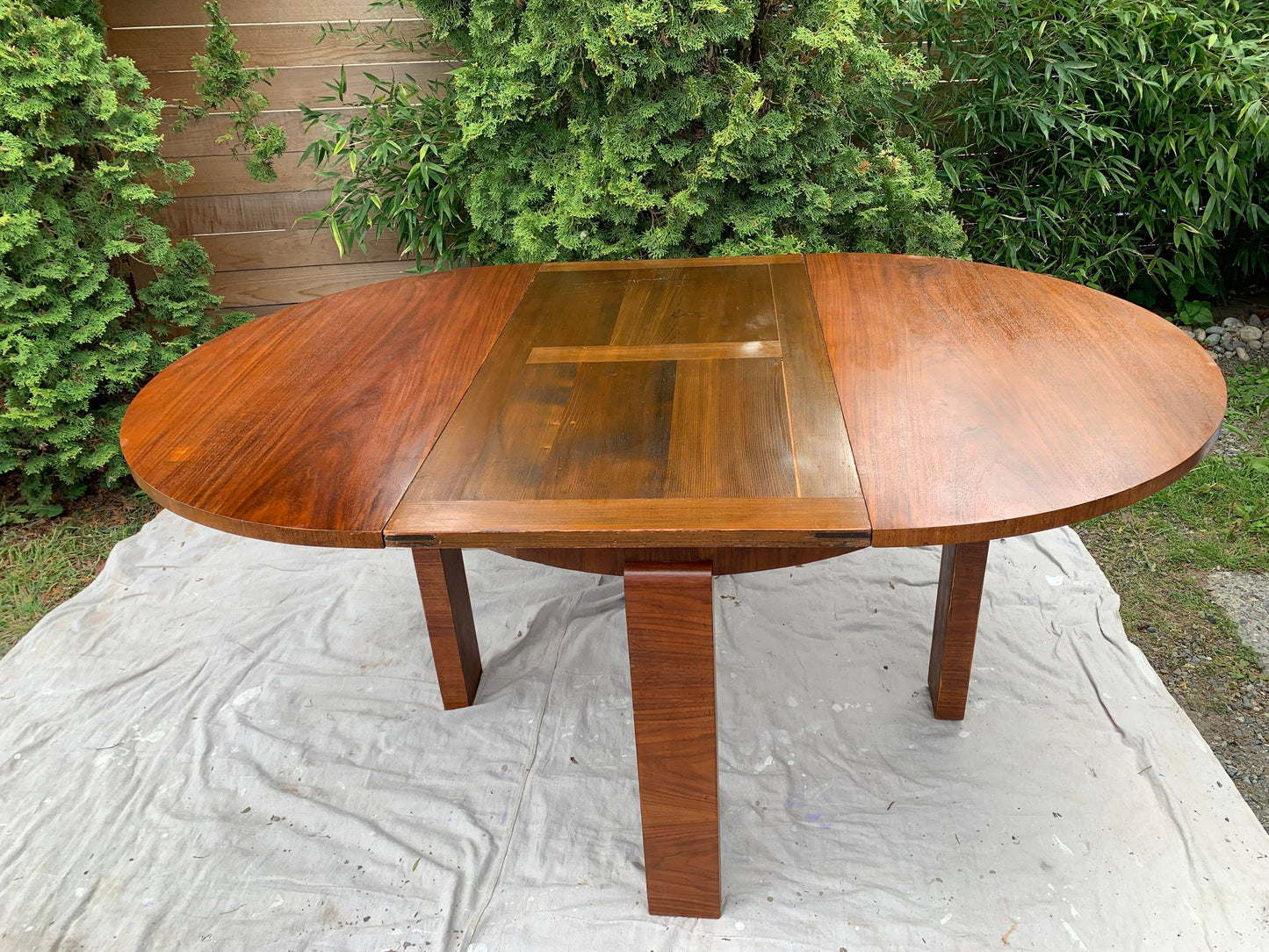 1950s Art Deco Style Circular Expandable Walnut Dining Table With Waterfall Leg