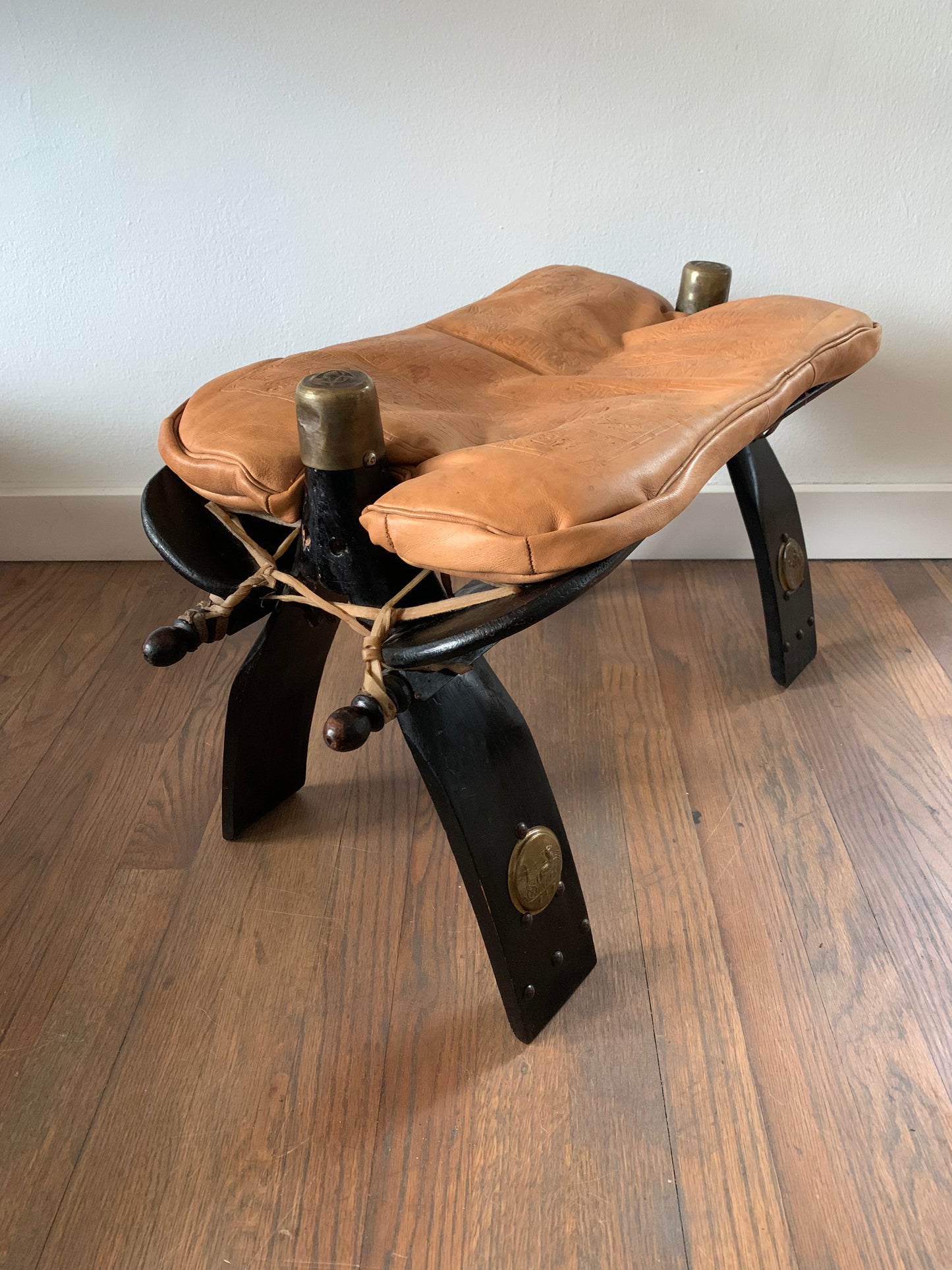 Vintage Leather Camel Saddle Ottoman Stool With Egyptian Motif