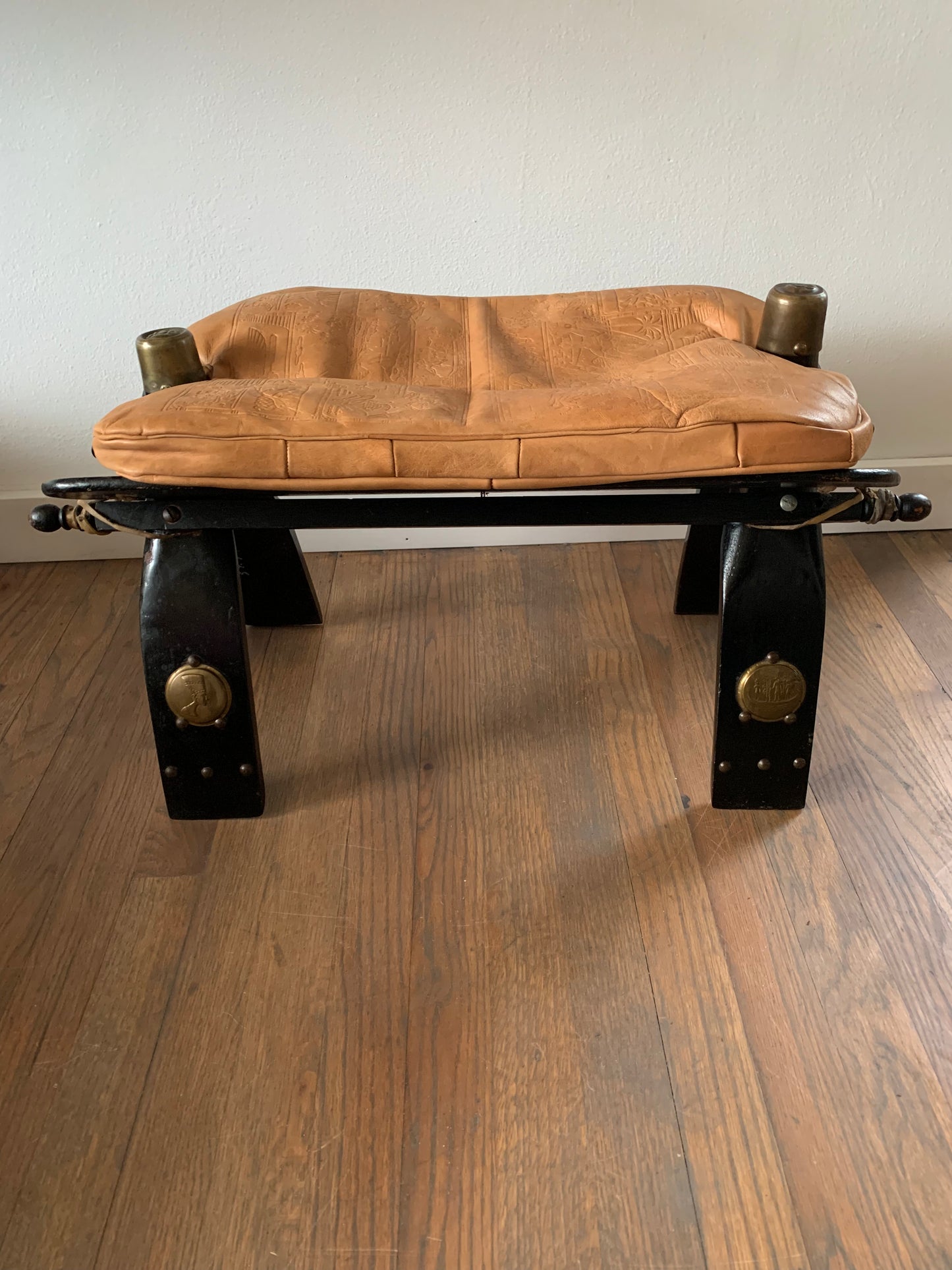 Vintage Leather Camel Saddle Ottoman Stool With Egyptian Motif
