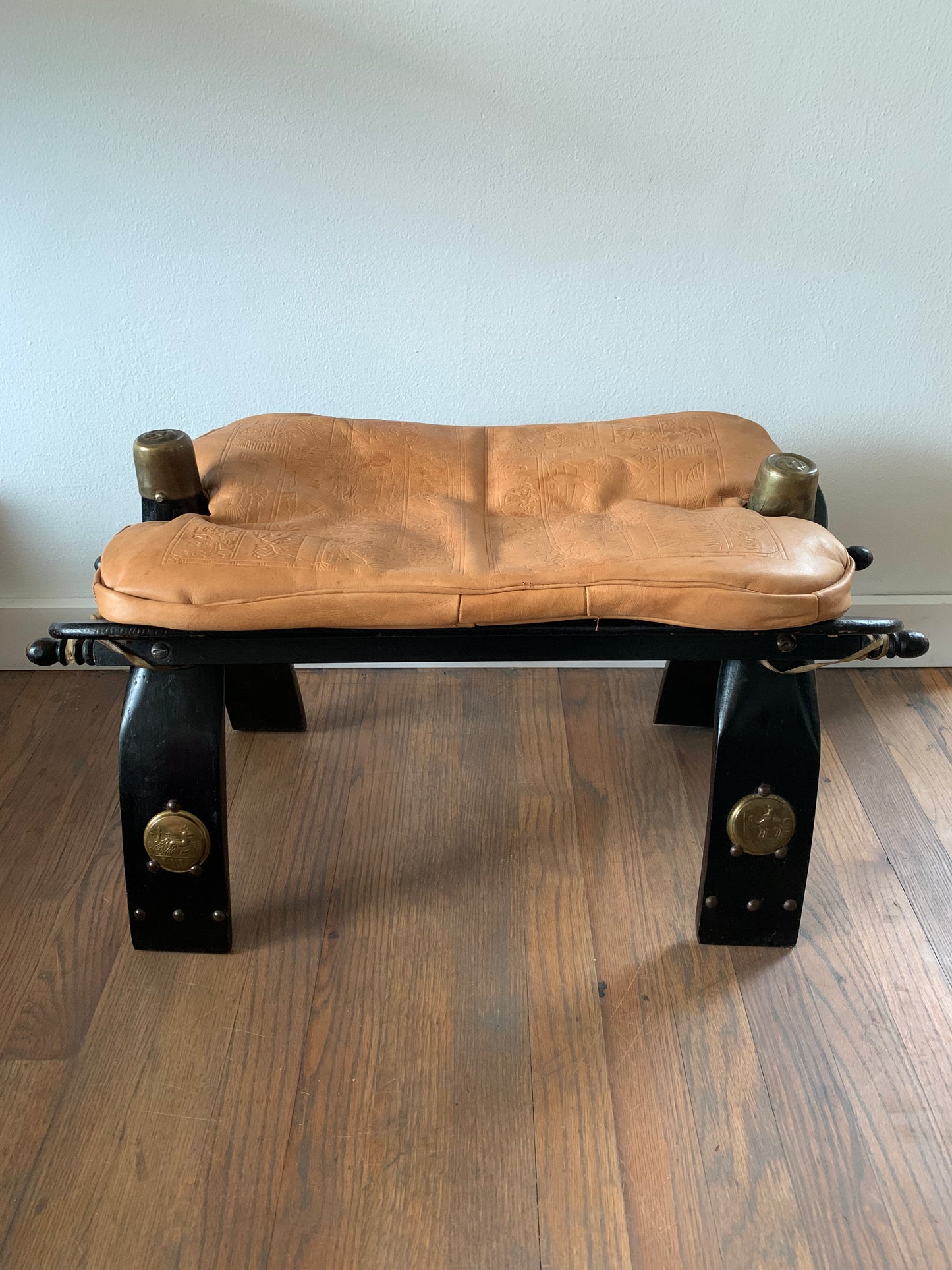 Vintage Leather Camel Saddle Ottoman Stool With Egyptian Motif