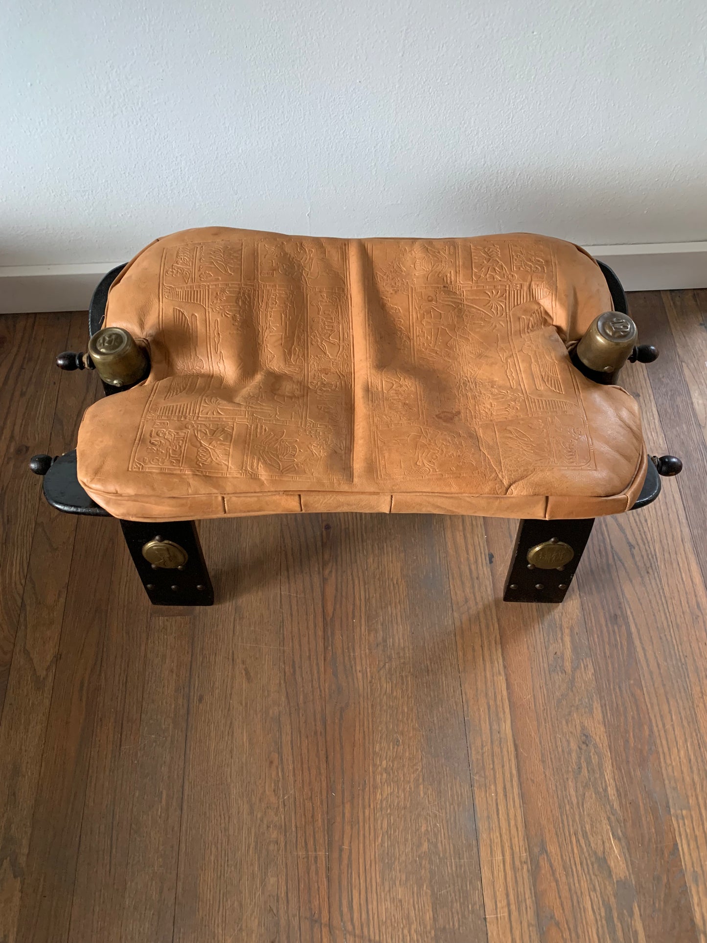 Vintage Leather Camel Saddle Ottoman Stool With Egyptian Motif