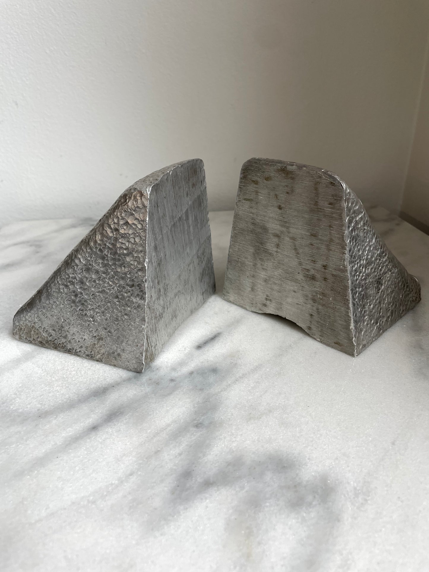 Late 20th Century Triangular Solid Aluminum Wedge Bookends- a Pair