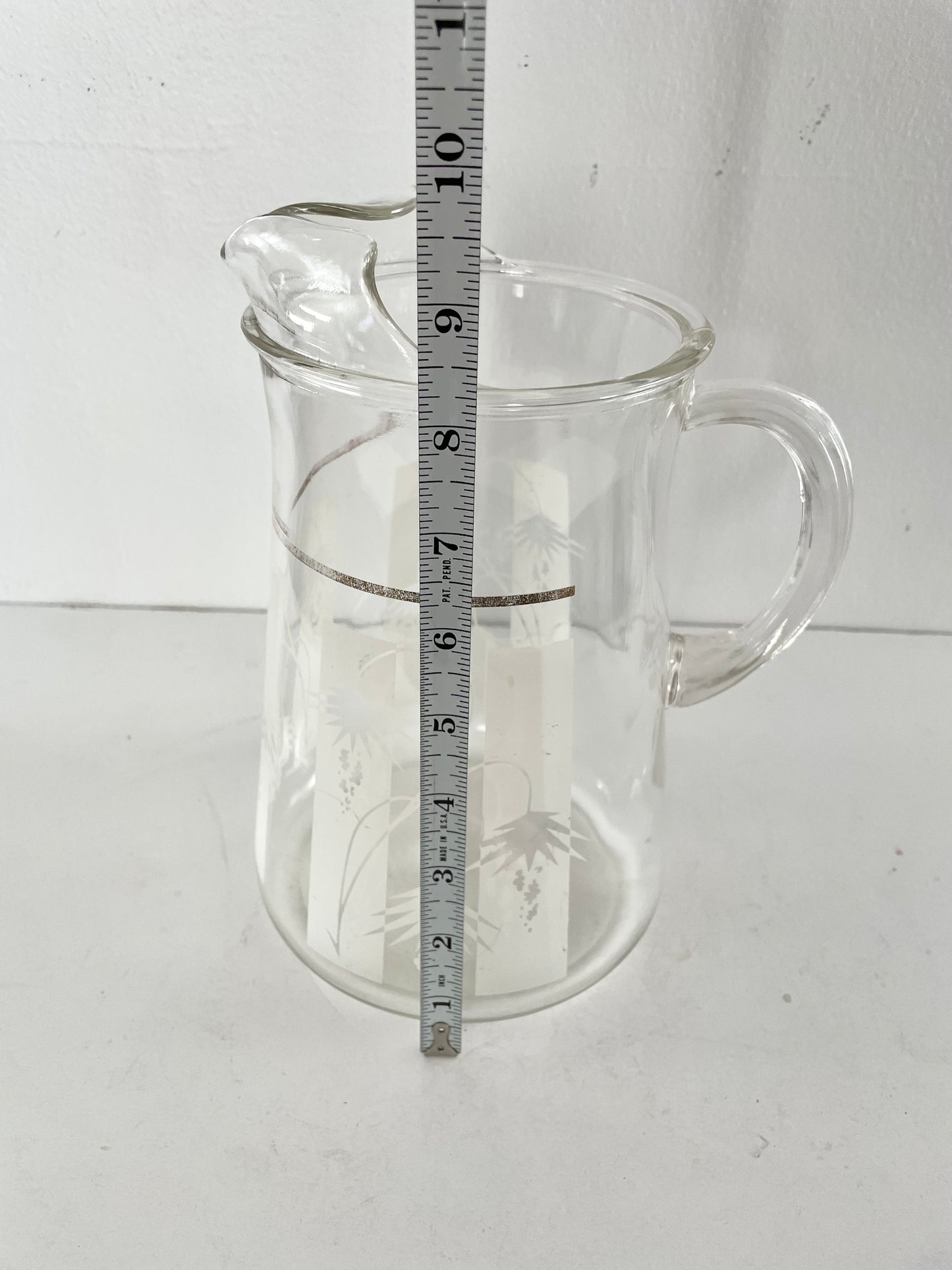 Mid Century Modern Living Clear Pitcher With White Painted Desert Flower