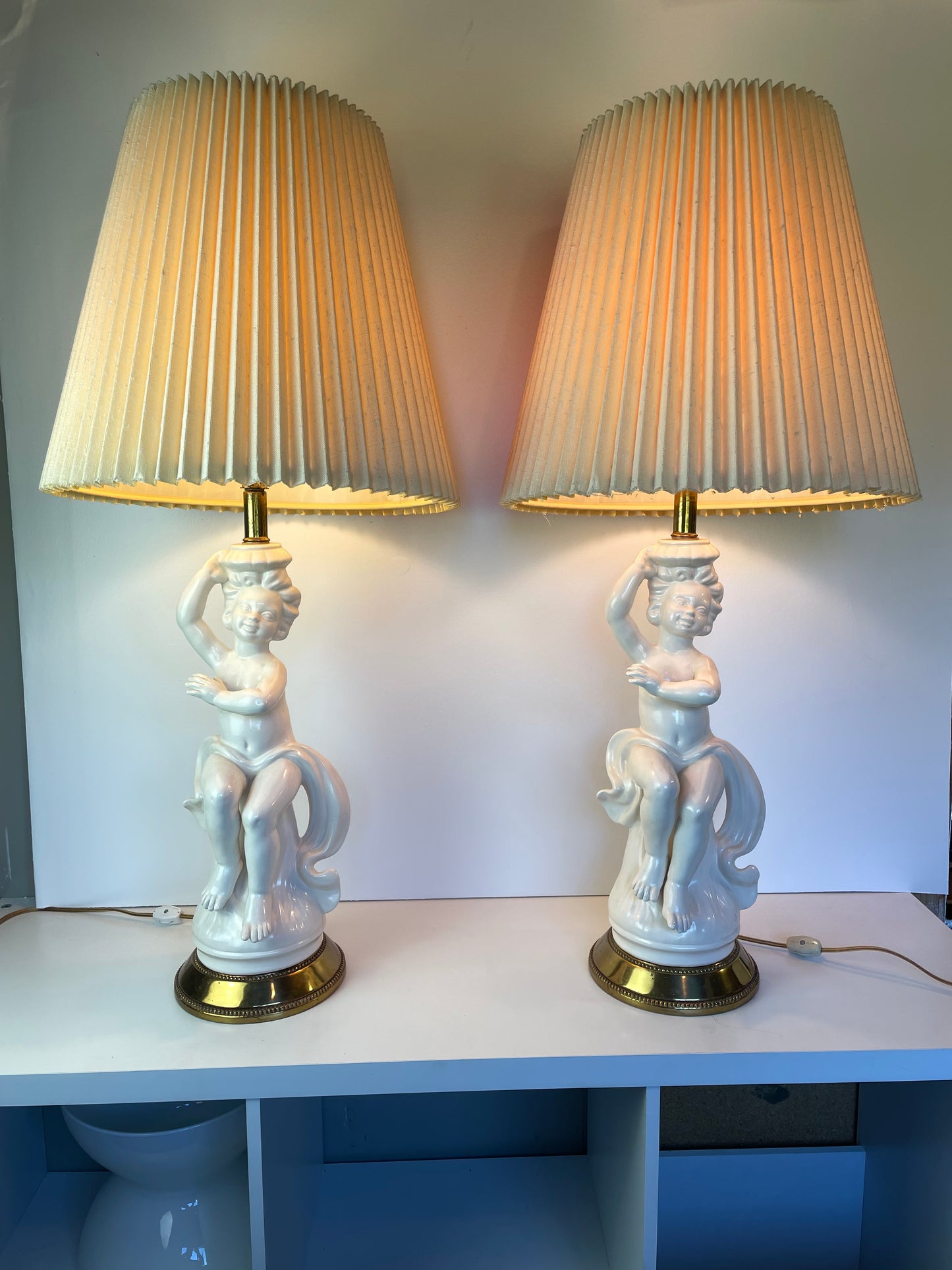 Mid 20th Century Hollywood Regency White Porcelain Cherub Lamps - A Pair
