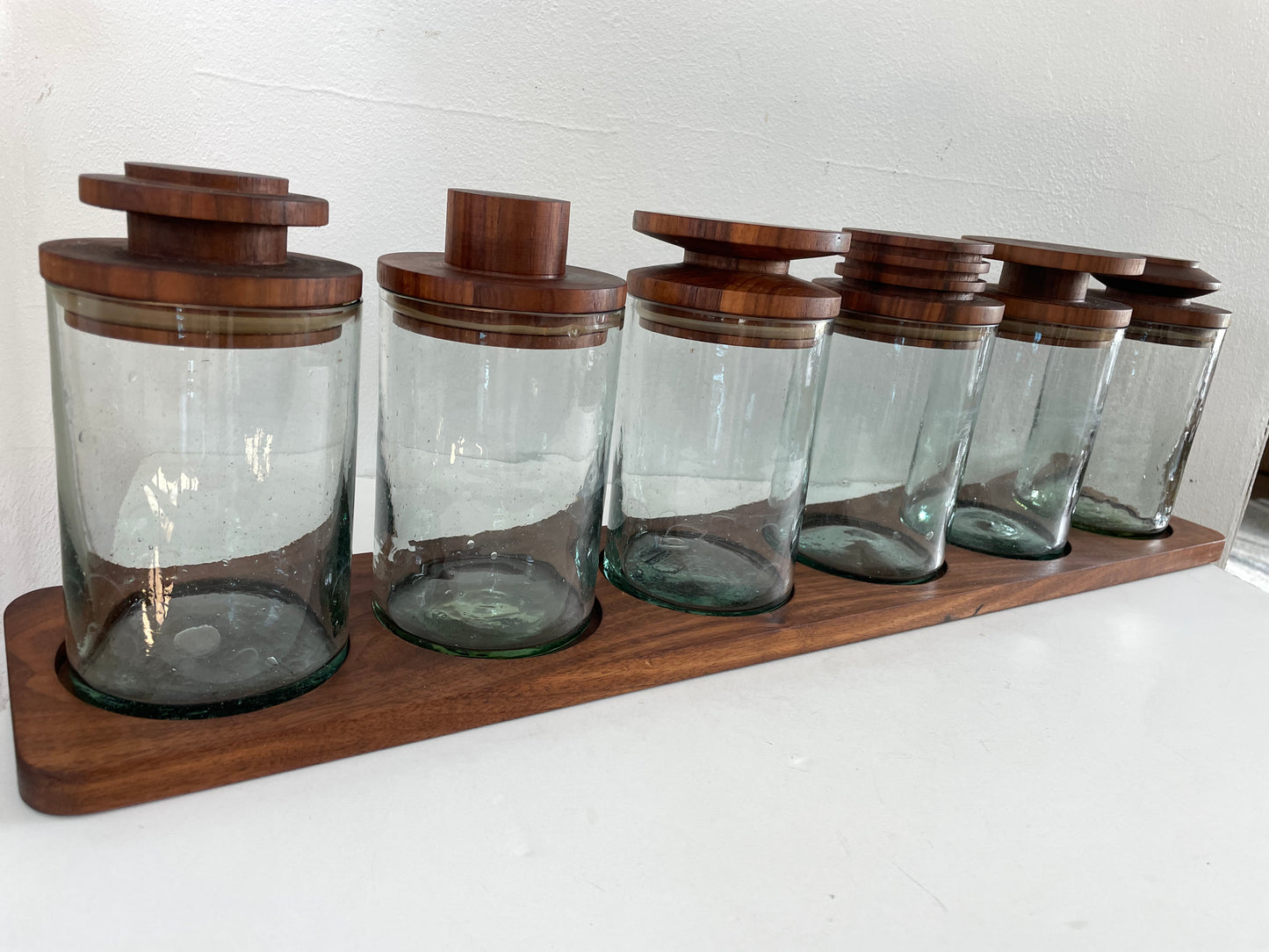 Mid 20th Century Solid Walnut and Blown Glass Canister Jars With Stand- 7 Pieces