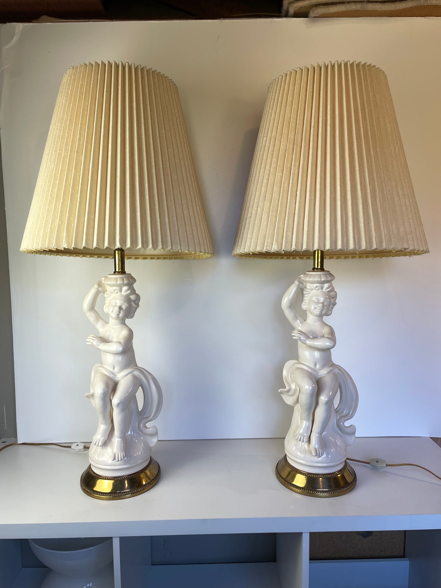 Mid 20th Century Hollywood Regency White Porcelain Cherub Lamps - A Pair
