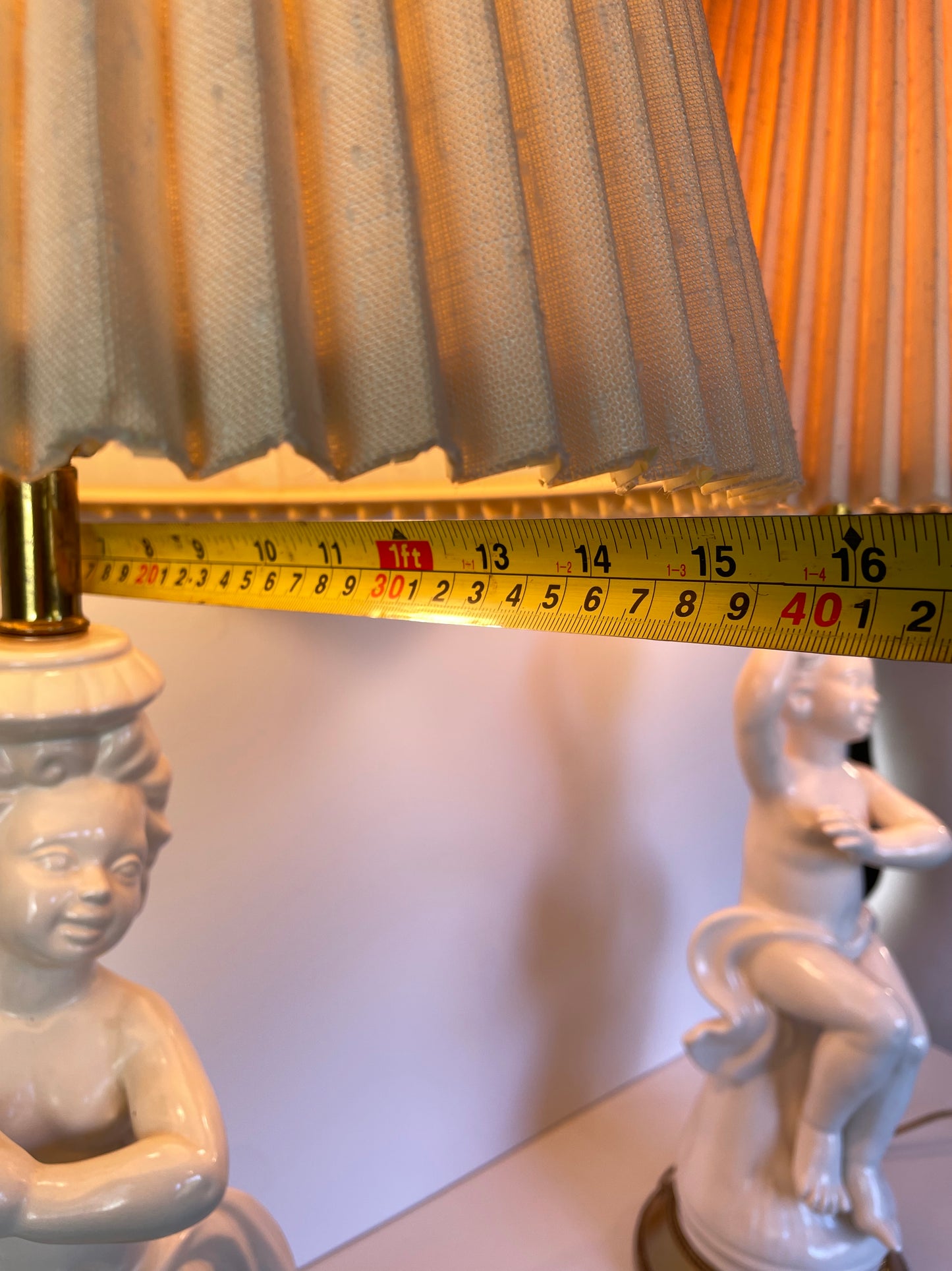 Mid 20th Century Hollywood Regency White Porcelain Cherub Lamps - A Pair