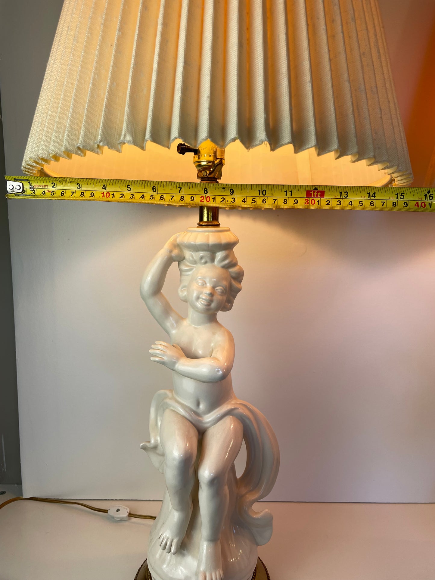 Mid 20th Century Hollywood Regency White Porcelain Cherub Lamps - A Pair