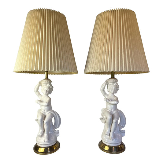 Mid 20th Century Hollywood Regency White Porcelain Cherub Lamps - A Pair