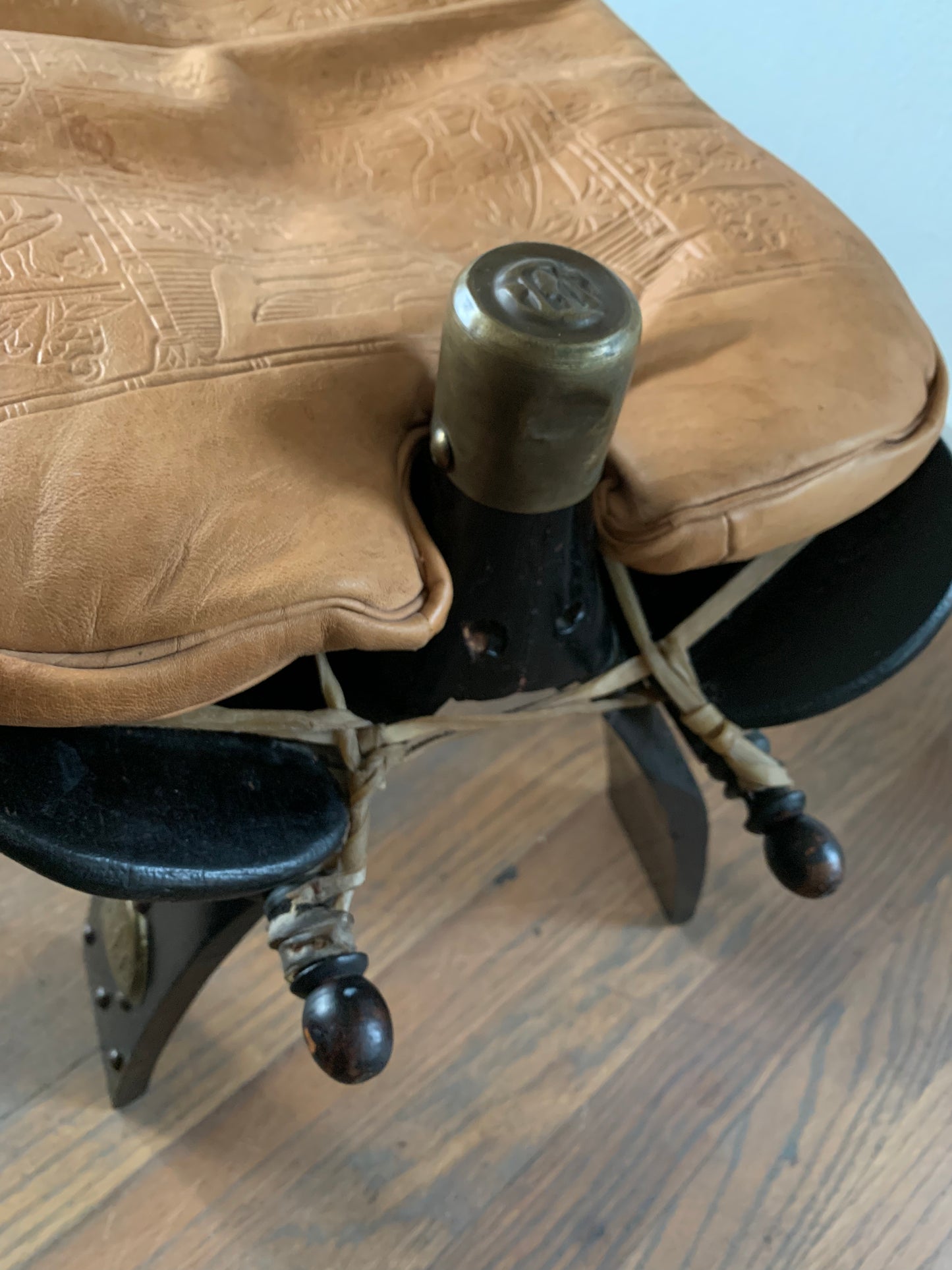 Vintage Leather Camel Saddle Ottoman Stool With Egyptian Motif